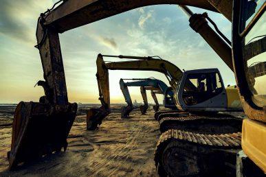 Row of construction equipment image for asset finance